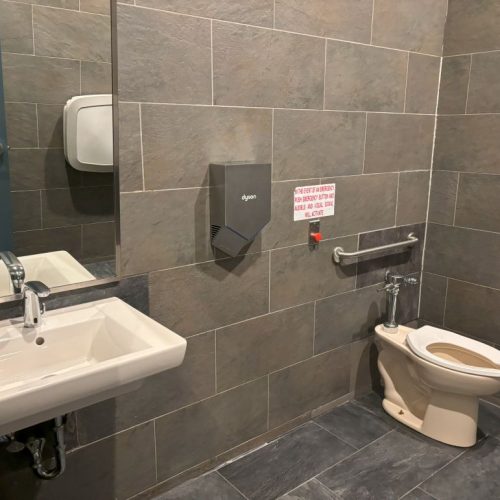 Flawless Commercial Restroom Plumbing for Turtle Jack's Mississauga 14 Close-up of a high-efficiency commercial restroom faucet installed by O Plus Plumbing.